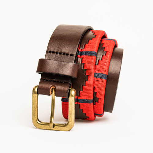 Close-up highlighting the buckle of the Country Direct & Pampeano Adjutant Generals Corps (AGC) Leather Polo Belt, featuring brown leather, with red thread detailing. 