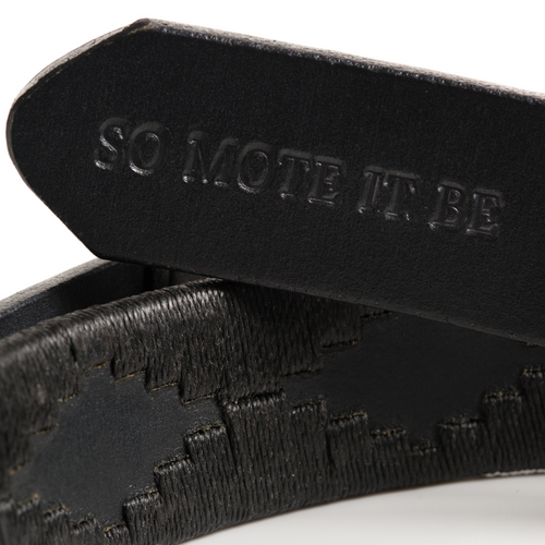 Close-up of the Freemasons leather polo belt leather and stitching detail
